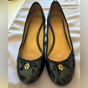 Tory Burch size 9M black patent leather wedge shoe. Used, in great condition.
